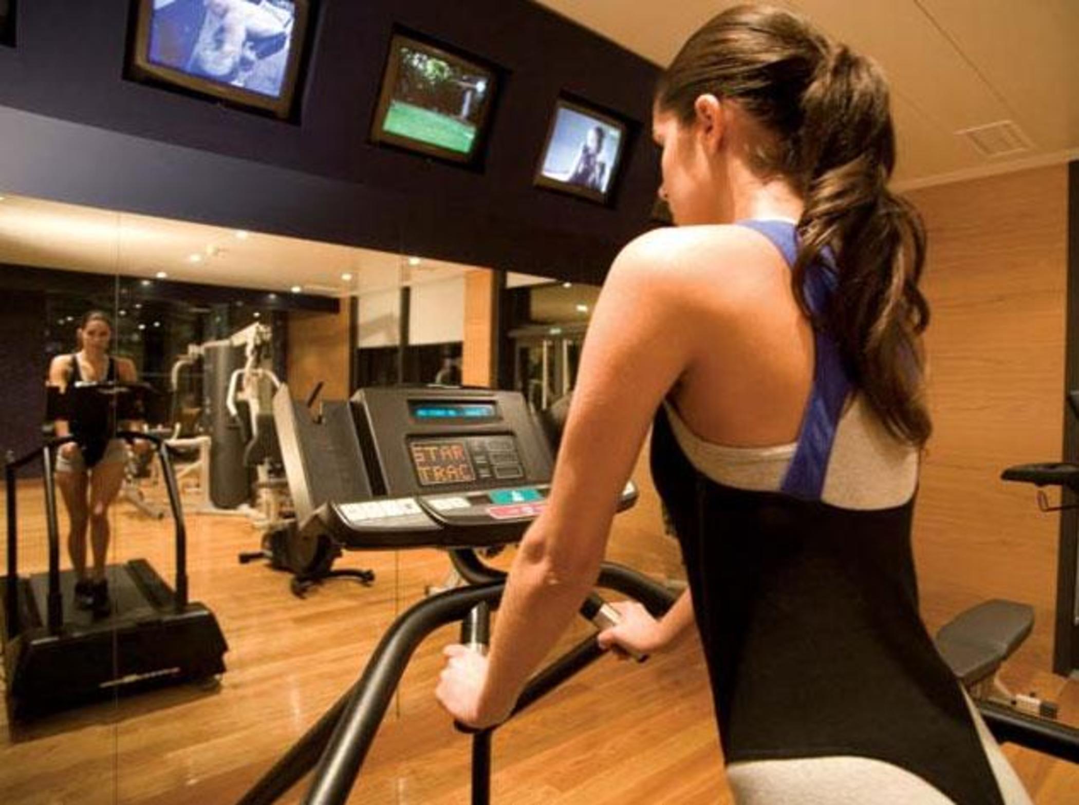 Montebelo Viseu Congress Hotel & Spa Εξωτερικό φωτογραφία A woman on a treadmill