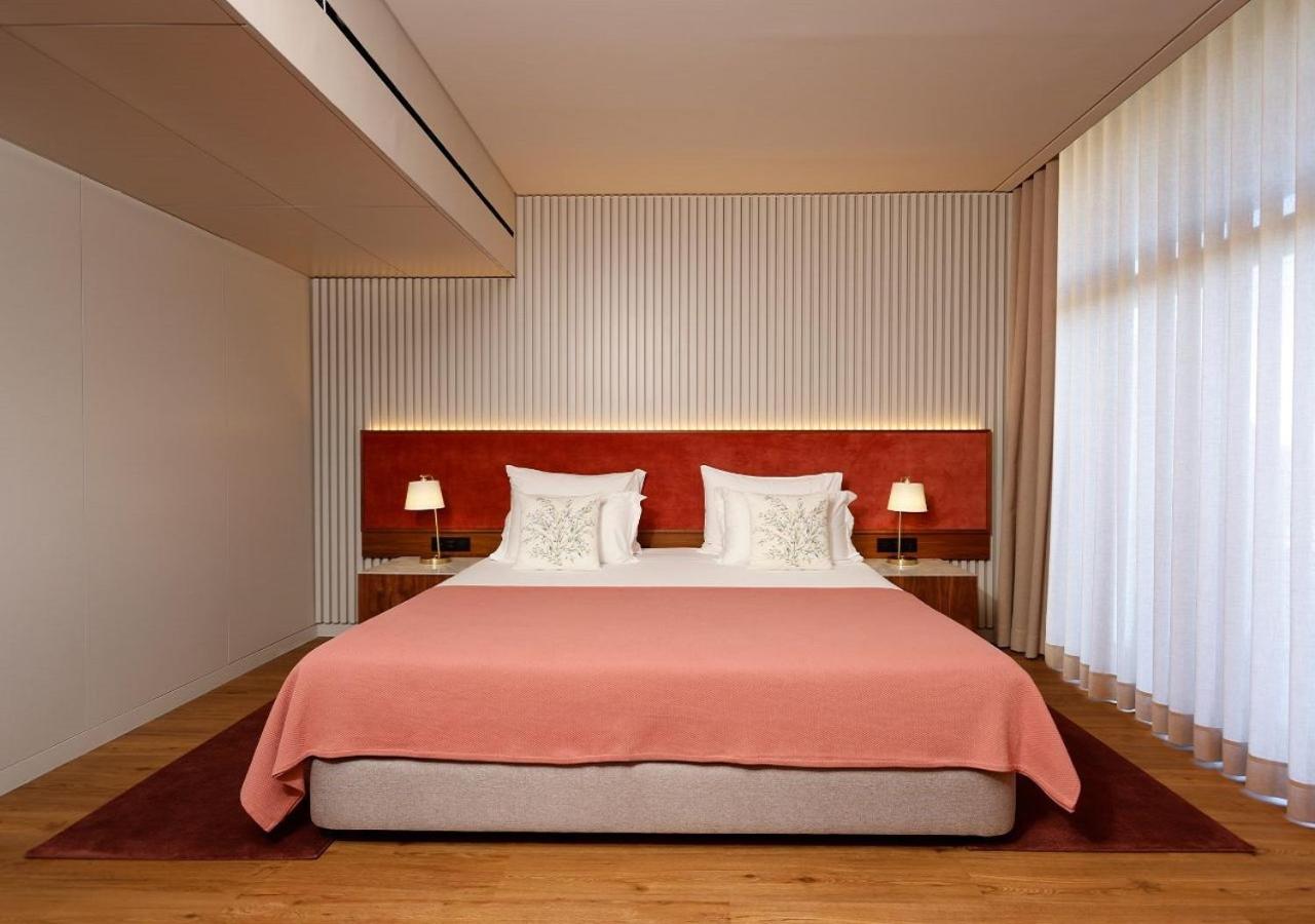 Montebelo Viseu Congress Hotel & Spa Εξωτερικό φωτογραφία A bedroom at the Mandarin Oriental, Munich